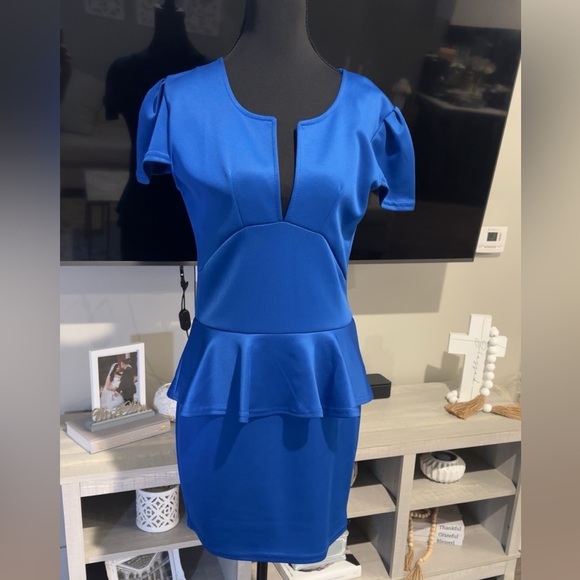 None Dresses & Skirts - NWT Chic Blue Peplum Dress V-neck